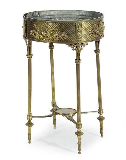 A FRENCH BRASS CIRCULAR JARDINIERE,
