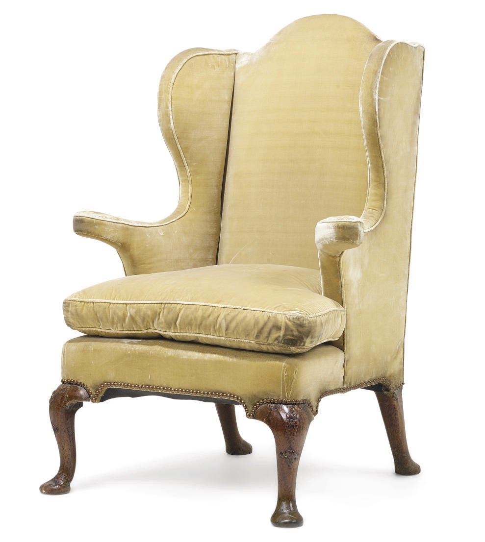 A GEORGE I WALNUT WING ARMCHAIR