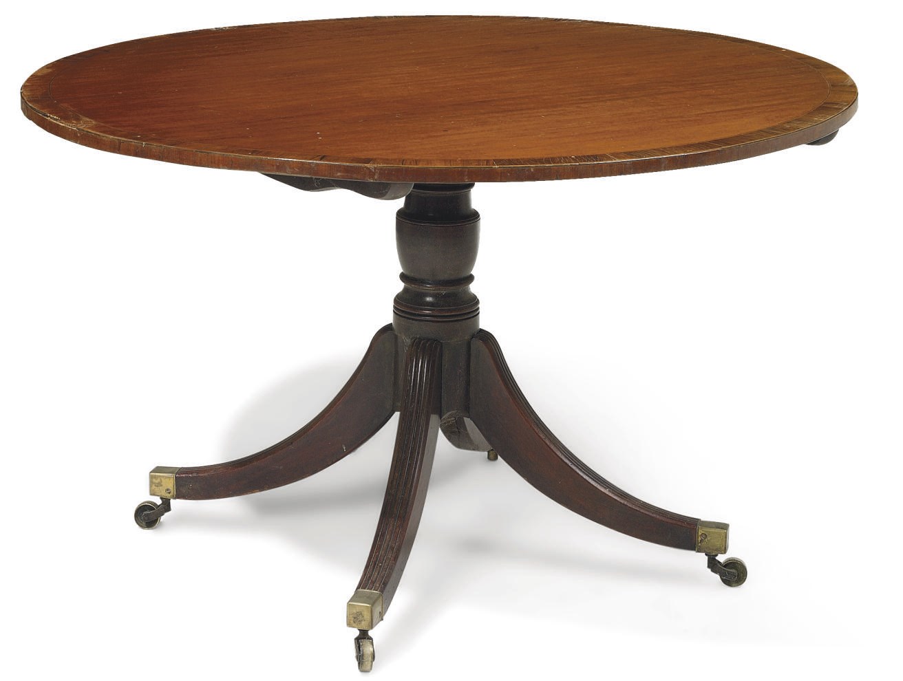 A REGENCY MAHOGANY AND ROSEWOOD BREAKFAST TABLE