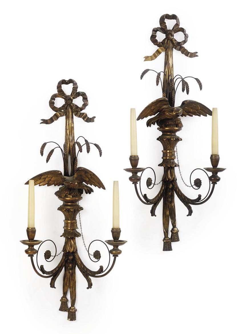 A SET OF FOUR TWO-LIGHT GILTWOOD WALL LIGHTS