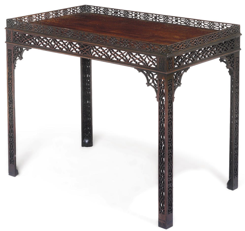 AN EDWARDIAN MAHOGANY SILVER TABLE