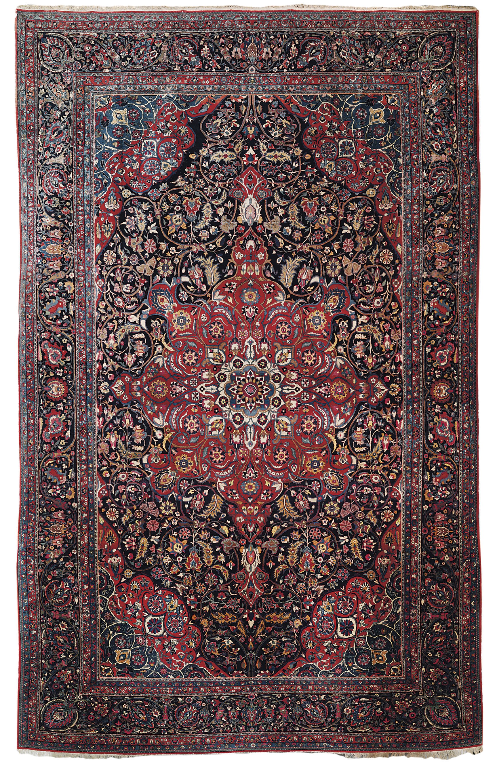 A FINE LARGE KASHAN CARPET