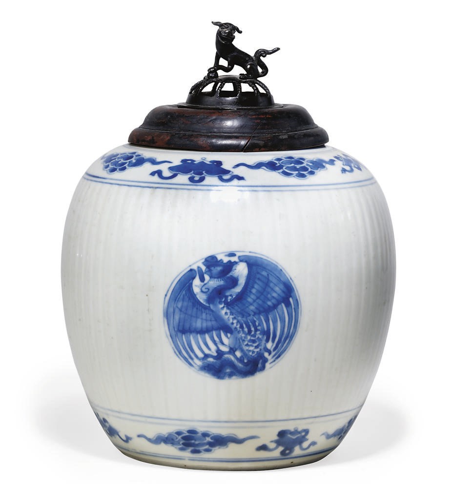 A CHINESE BLUE AND WHITE JAR AND COVER