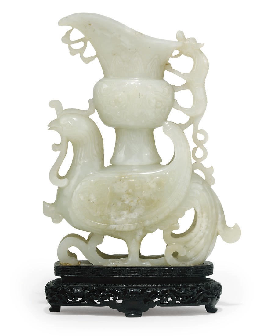 A CHINESE PALE CELADON JADE VASE