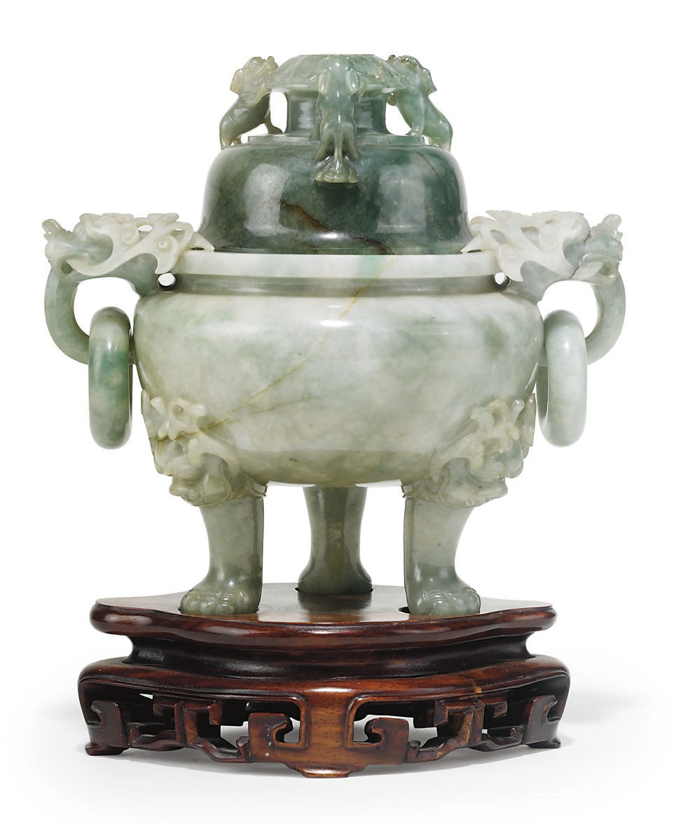 A CHINESE CELADON JADE TRIPOD CENSER AND COVER