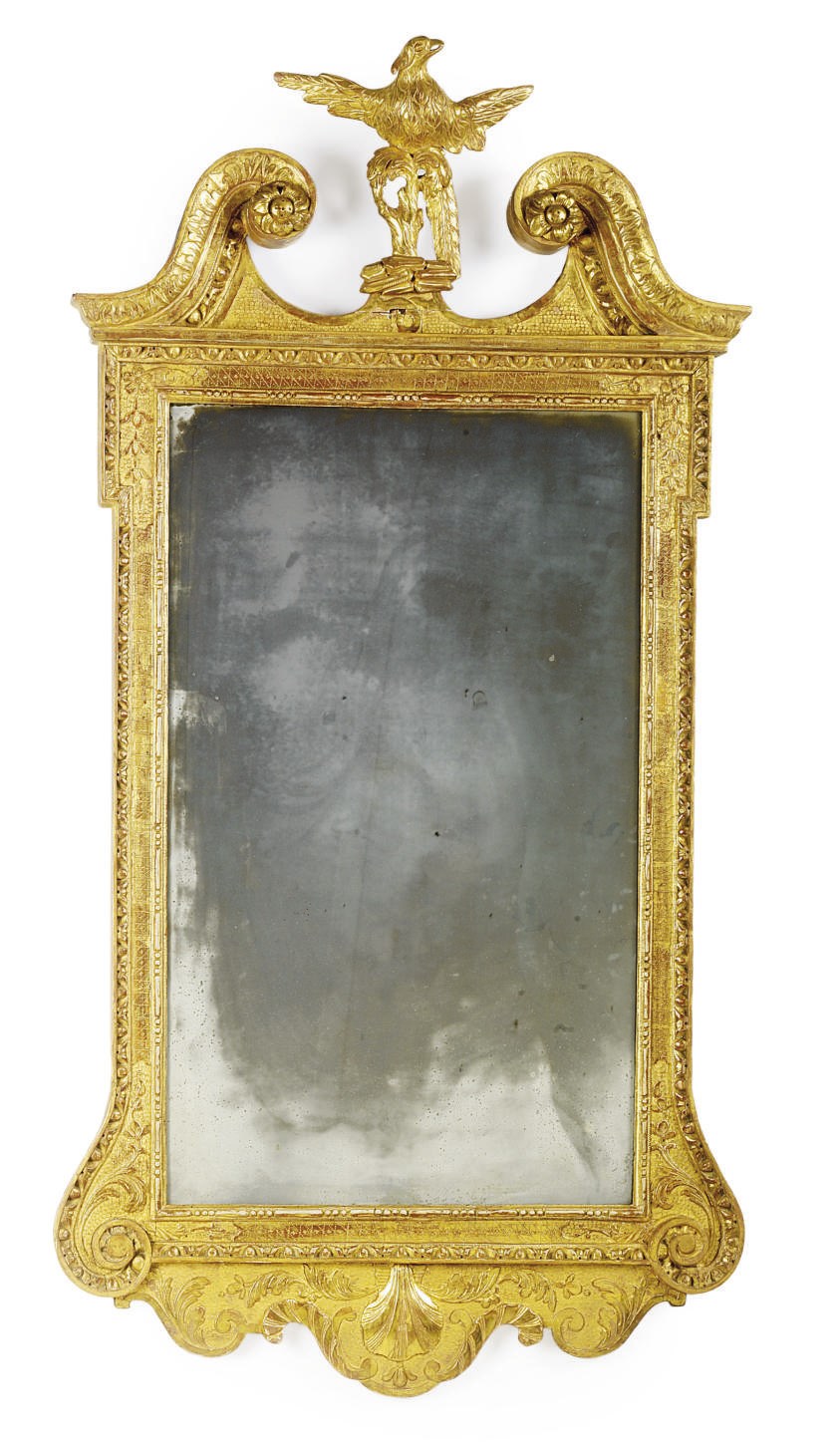 A GEORGE II GILTWOOD MIRROR