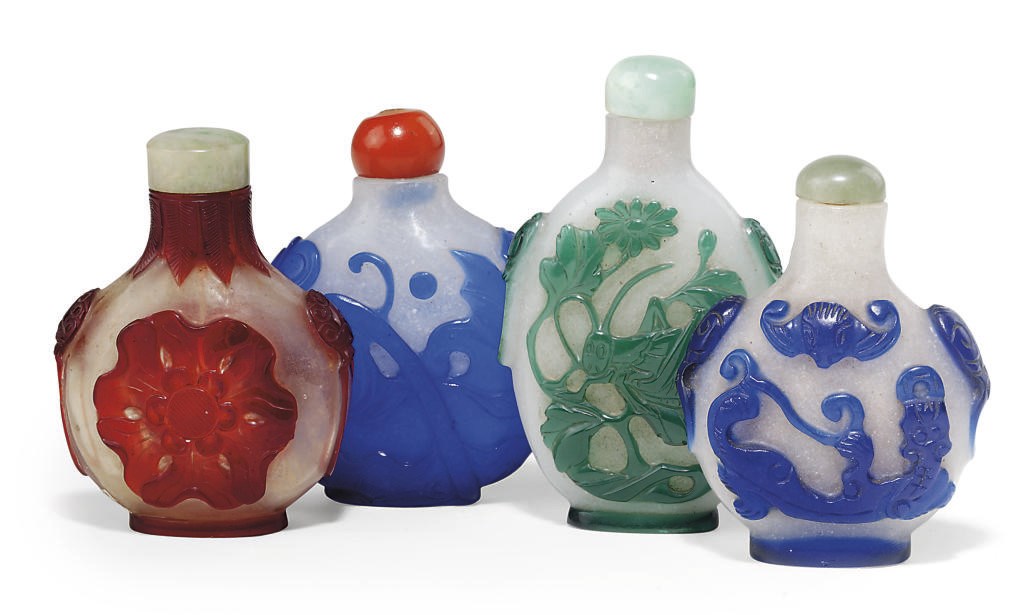 A GROUP OF FOUR CHINESE GLASS OVERLAY SNUFF BOTTLES