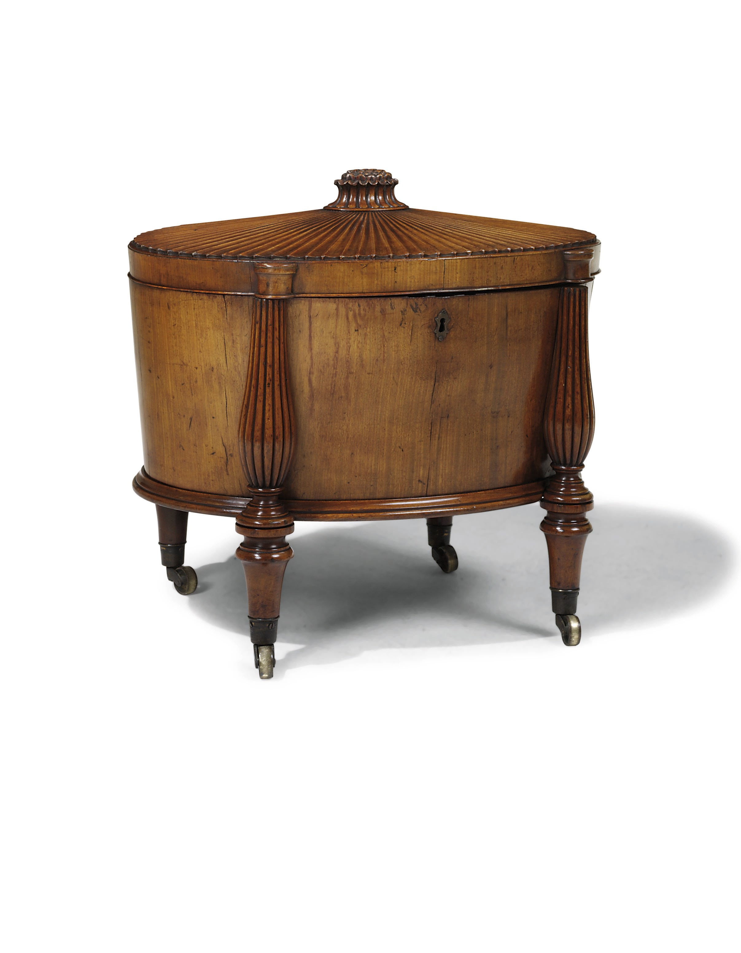A REGENCY MAHOGANY OVAL CELLARET