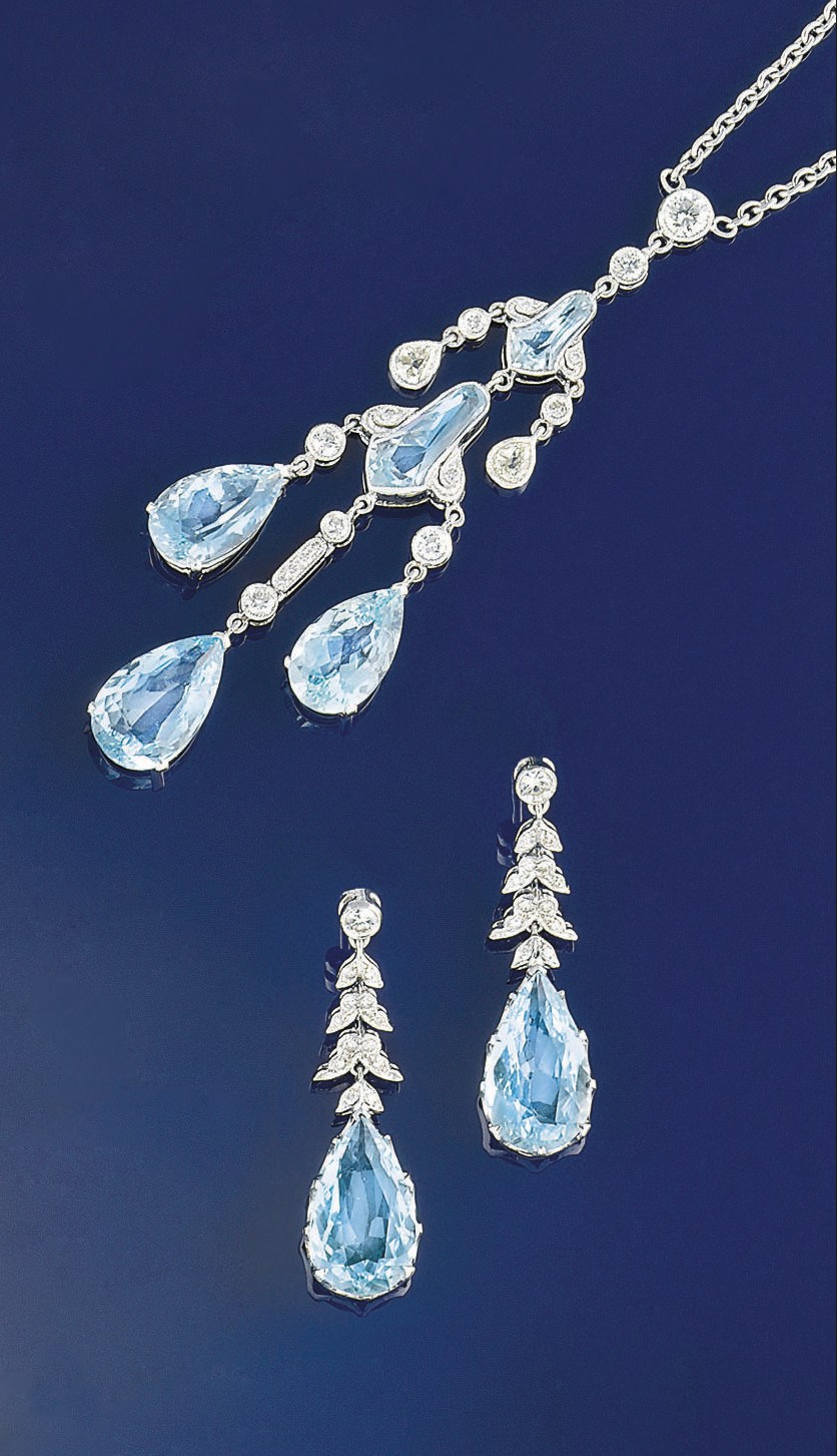 An aquamarine and diamond pendant necklace and earrings