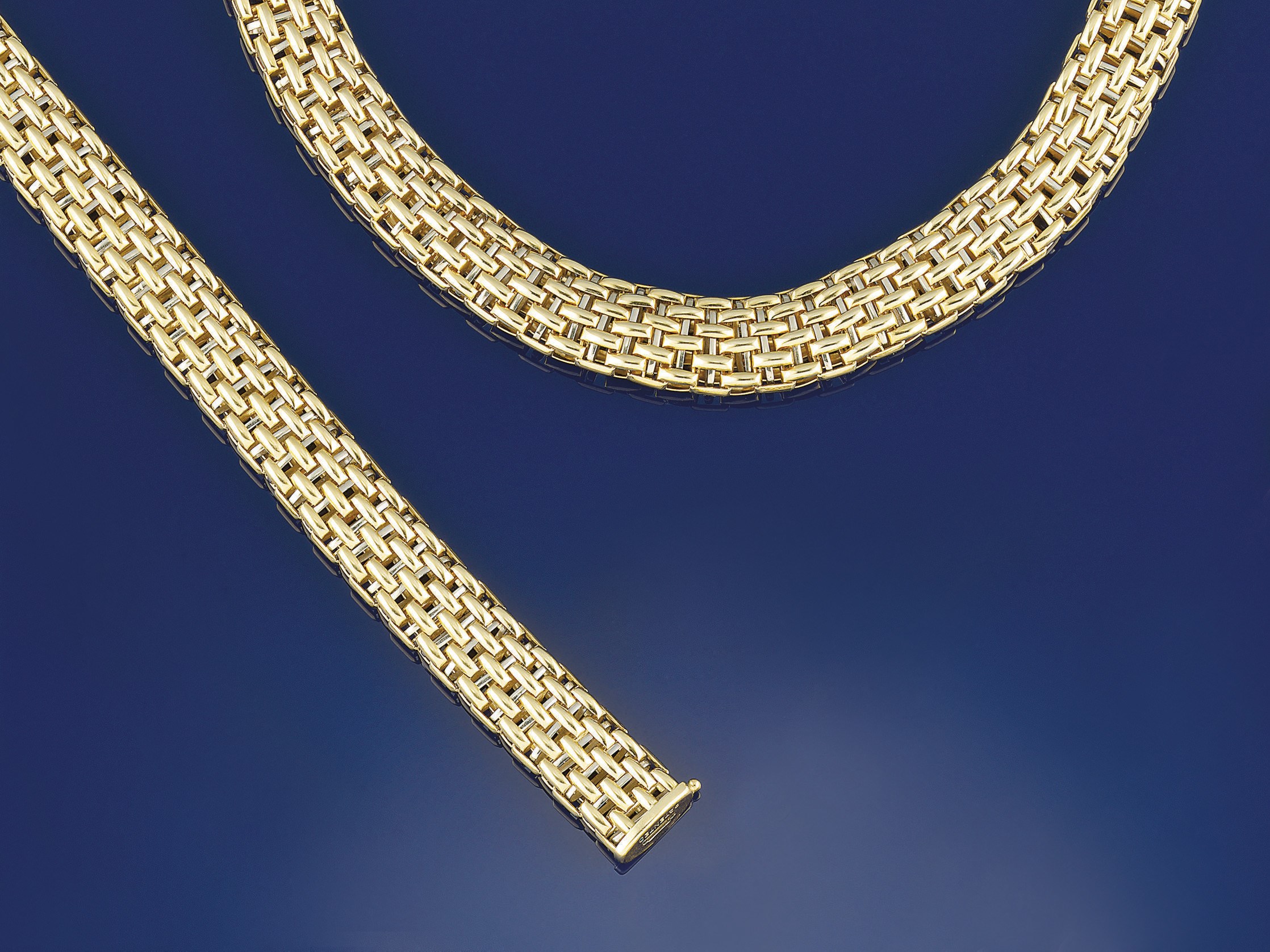 A fancy-link necklace and bracelet