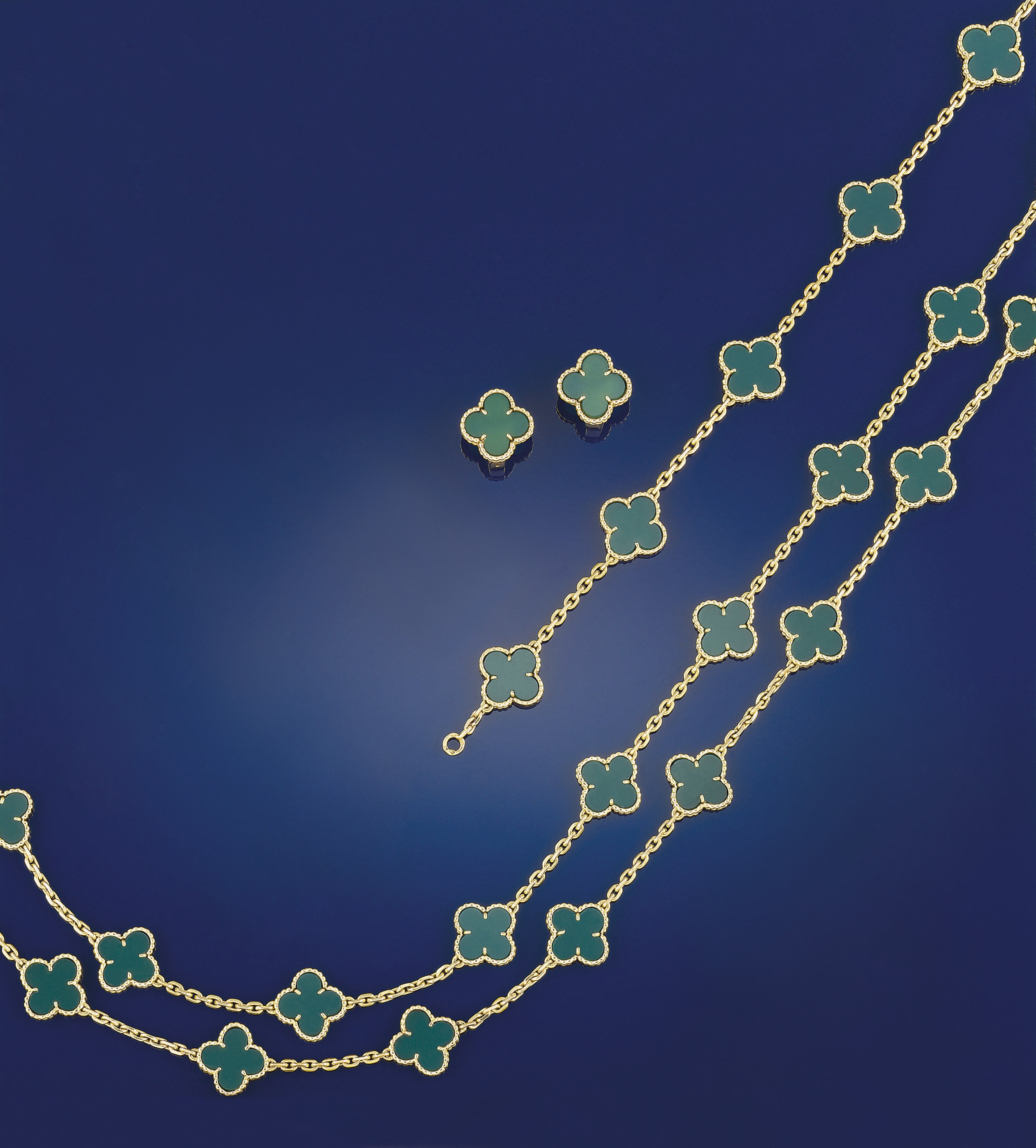 A suite of green chalcedony "Alhambra" jewellery, by Van Cleef & Arpels