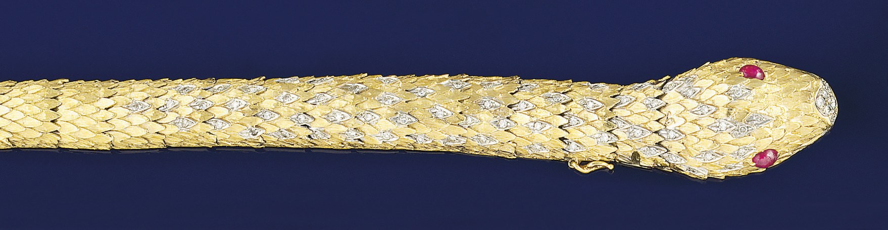 A diamond and ruby set serpent bracelet