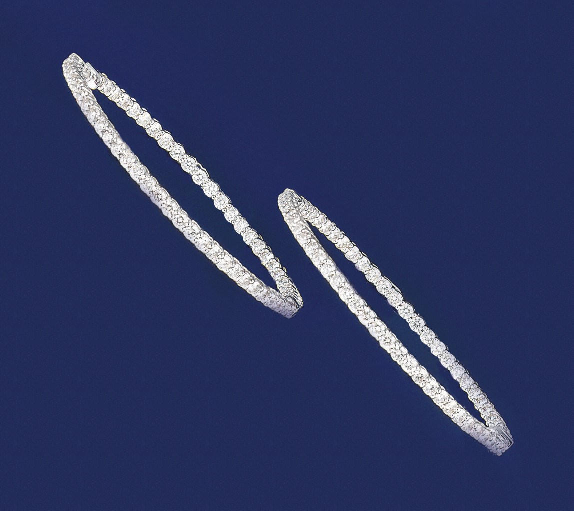 A PAIR OF DIAMOND HOOP EARRINGS