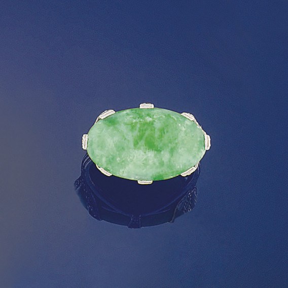 An early 20th century jadeite jade and diamond ring