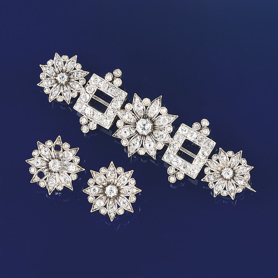 A diamond brooch and earstuds