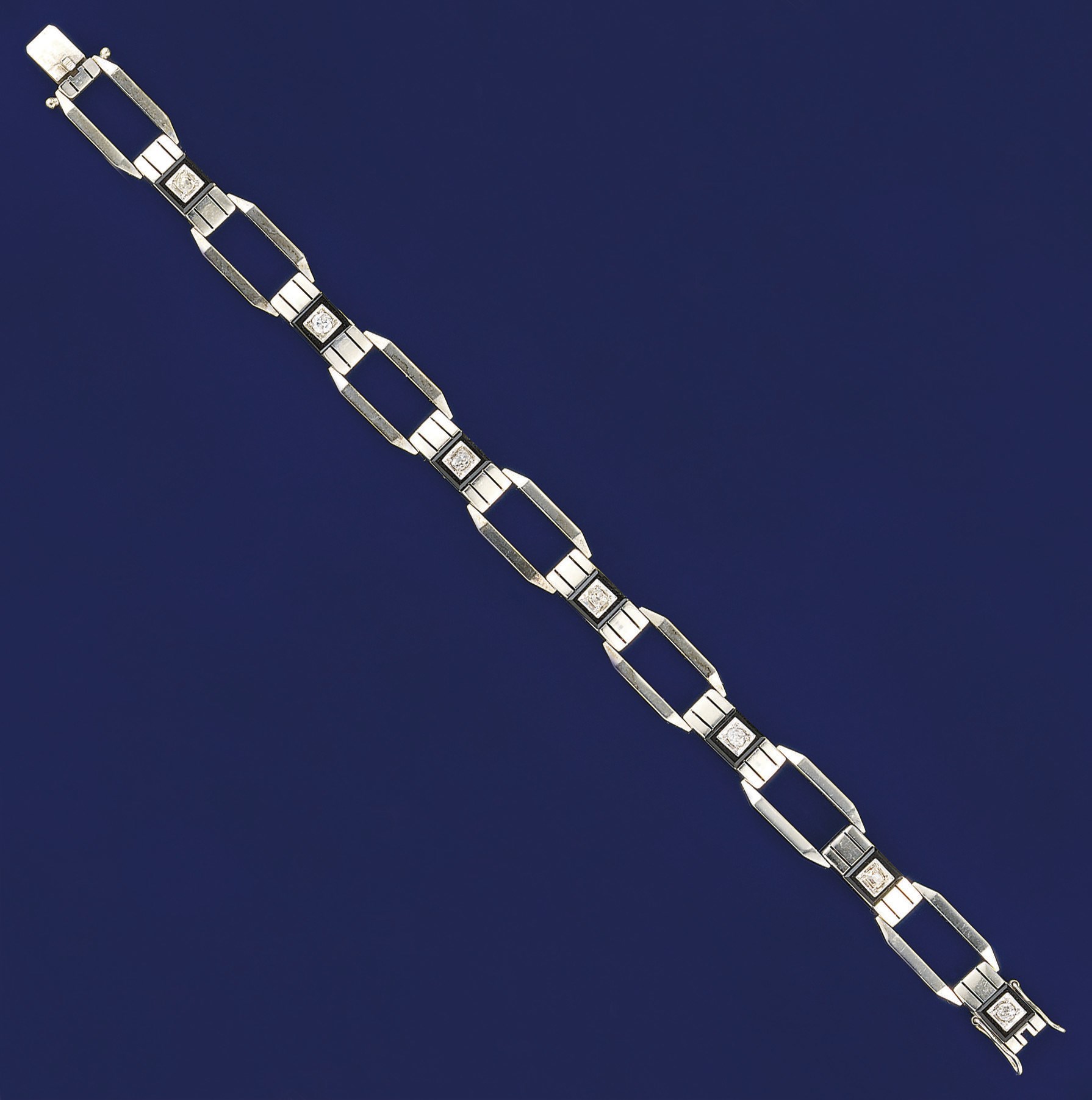 An Art Deco, onyx and diamond bracelet