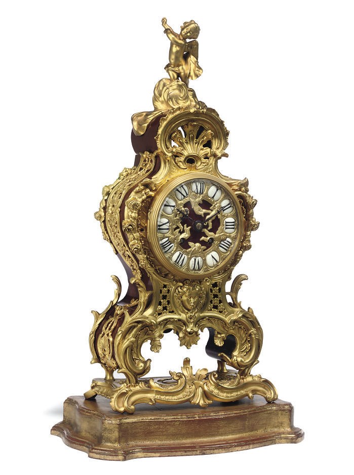A FRENCH ORMOLU-MOUNTED TULIPWOOD MANTEL CLOCK