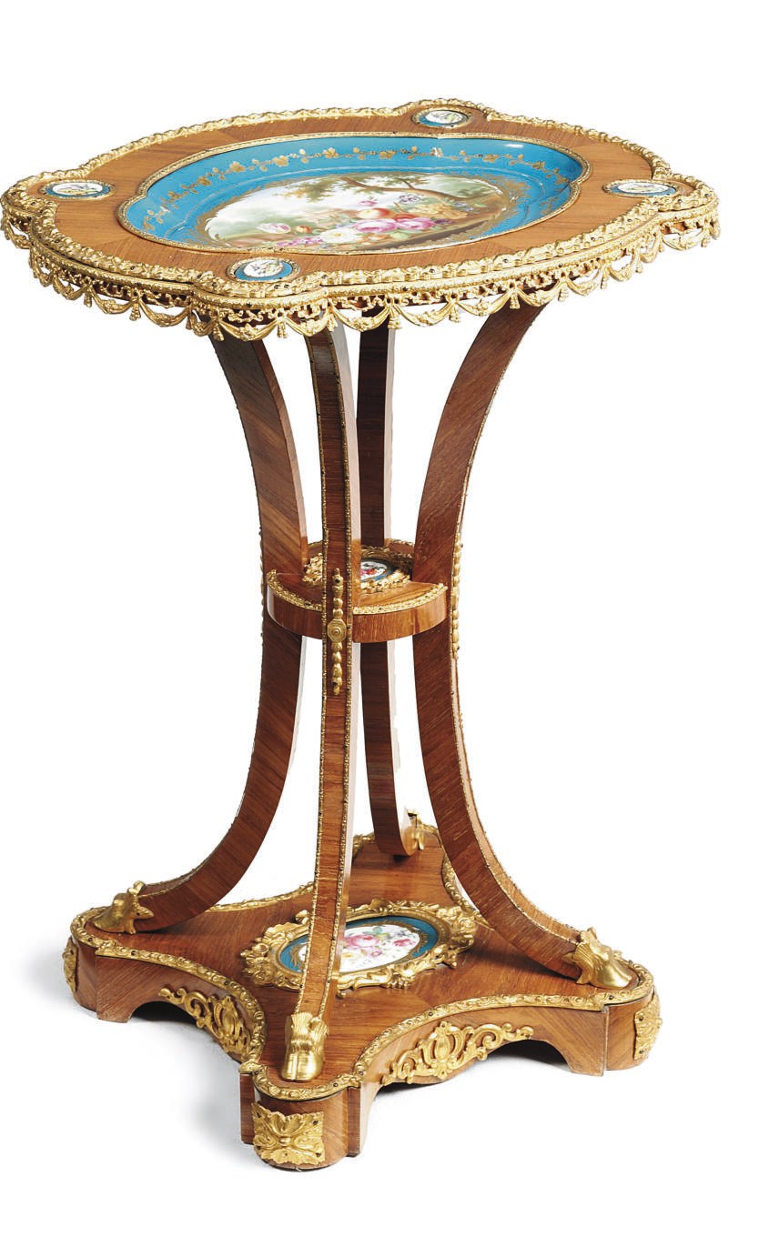 A NAPOLEON III ORMOLU AND SEVRES STYLE TURQUOISE-GROUND PORCELAIN-MOUNTED TULIPWOOD GUERIDON