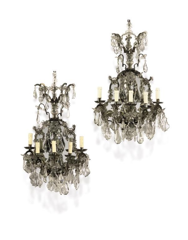 A PAIR OF FRENCH SILVERED METAL AND CUT GLASS FIVE-LIGHT WALL APPLIQUES