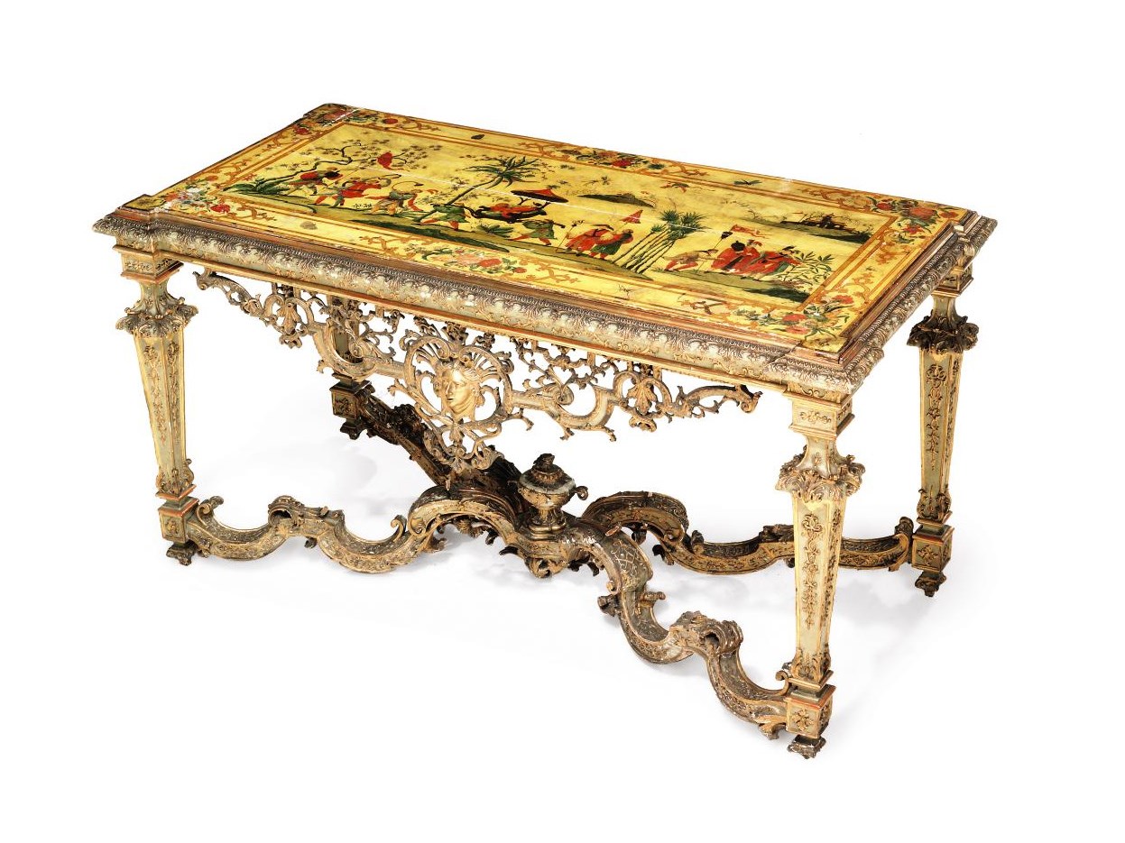 A NORTH ITALIAN GILTWOOD AND POLYCHROME-PAINTED CONSOLE TABLE