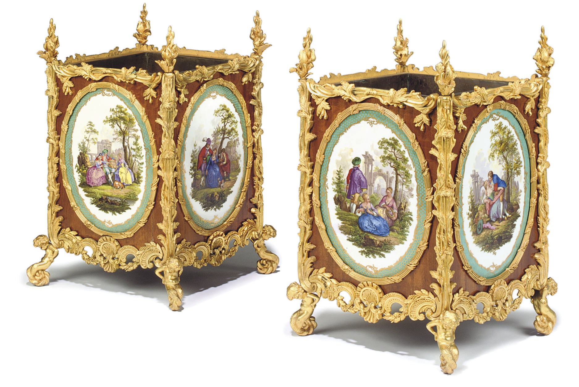 A PAIR OF NAPOLEON III ORMOLU AND SEVRES STYLE TURQUOISE GROUND PORCELAIN-MOUNTED TULIPWOOD JARDINIERES