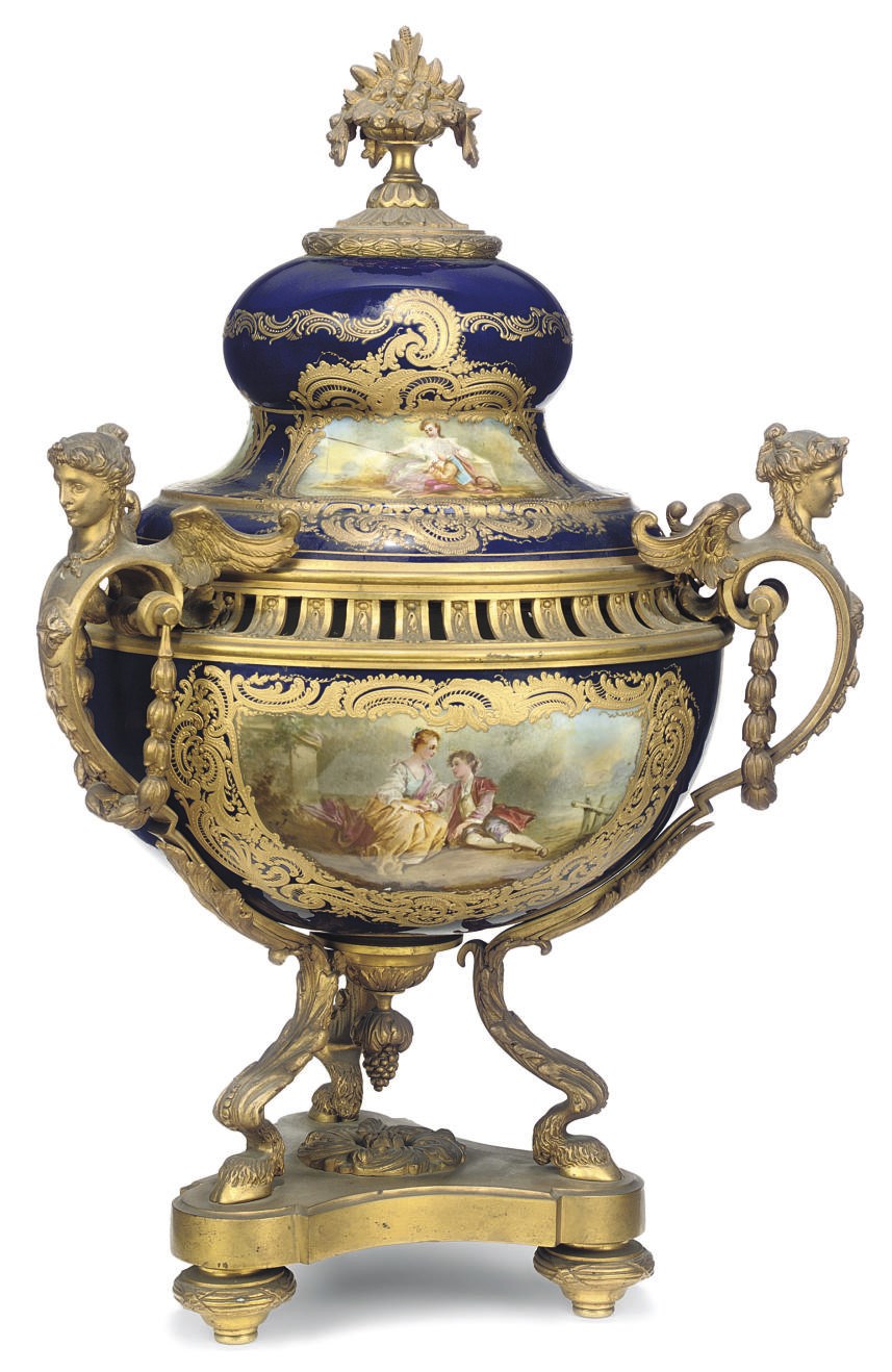 A FRENCH ORMOLU-MOUNTED SEVRES STYLE COBALT-BLUE GROUND CENTREPIECE
