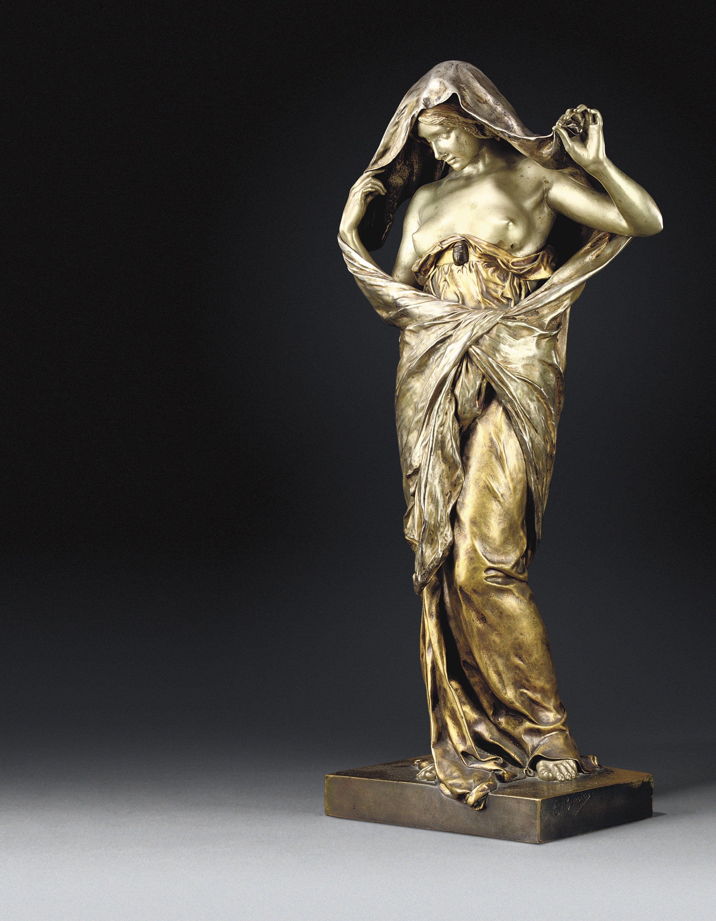 A FRENCH GILT AND SILVERED-BRONZE FIGURE ENTITLED 'LA NATURE SE DEVOILANT DEVANT LA SCIENCE'