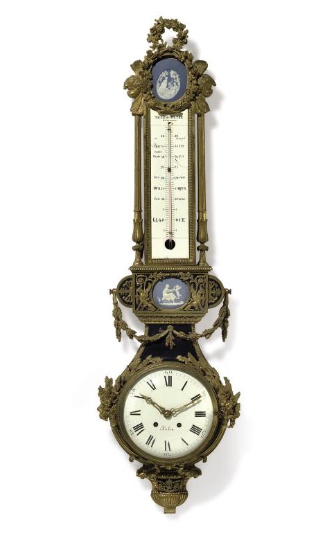 A FRENCH ORMOLU AND JASPERWARE-MOUNTED CARTEL D'APPLIQUE