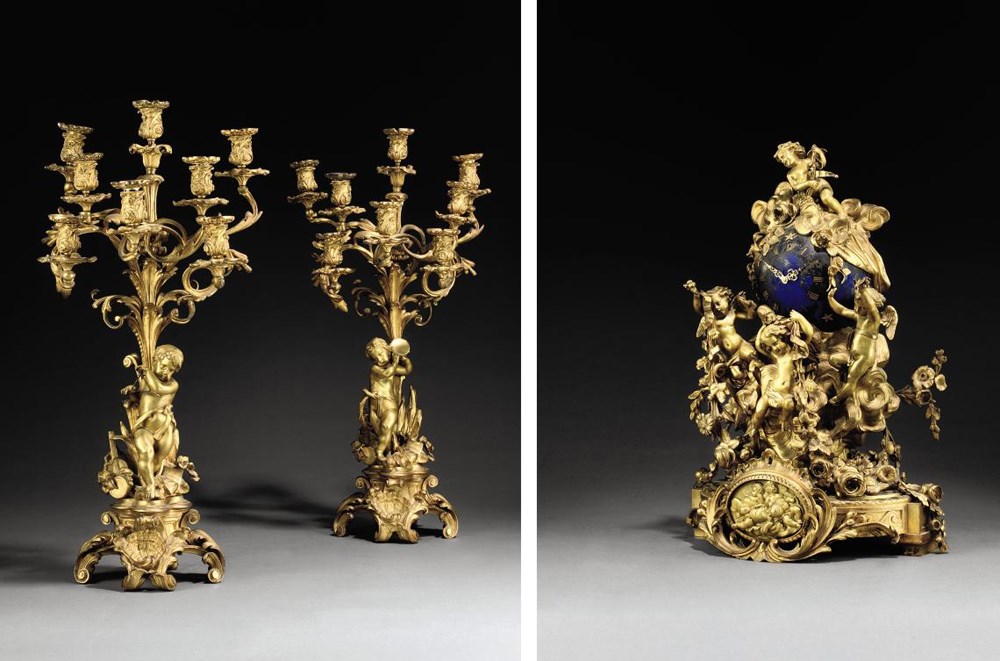 A NAPOLEON III ORMOLU AND BLUED-METAL THREE-PIECE GARNITURE