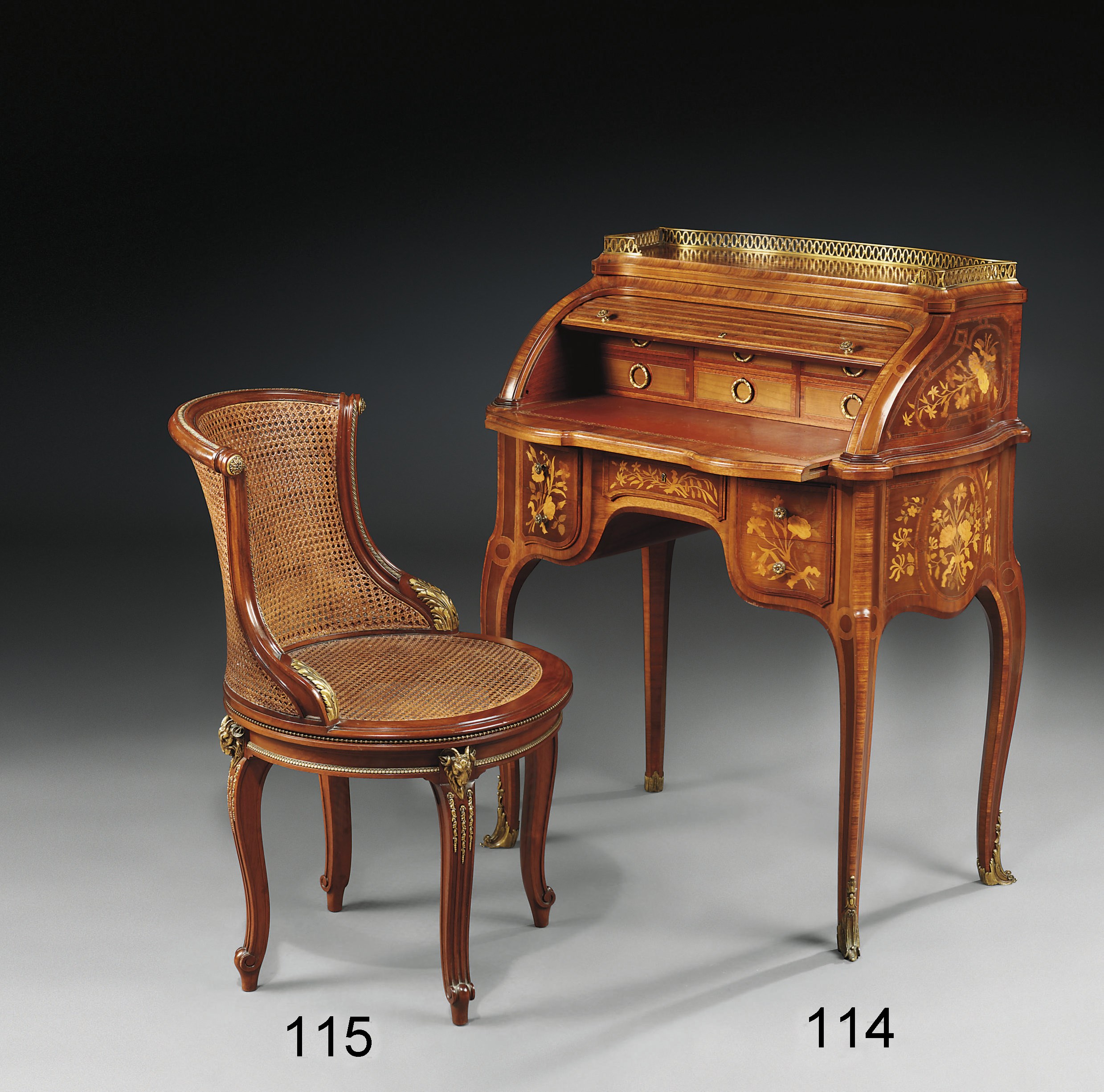 A FRENCH ORMOLU-MOUNTED MAHOGANY FAUTEUIL DE BUREAU