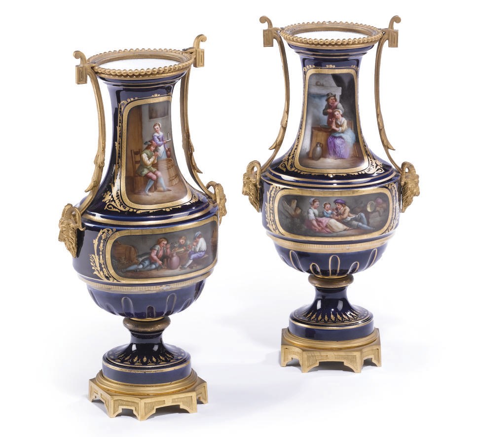 A PAIR OF ORMOLU-MOUNTED SEVRES STYLE COBALT-BLUE GROUND BALUSTER VASES