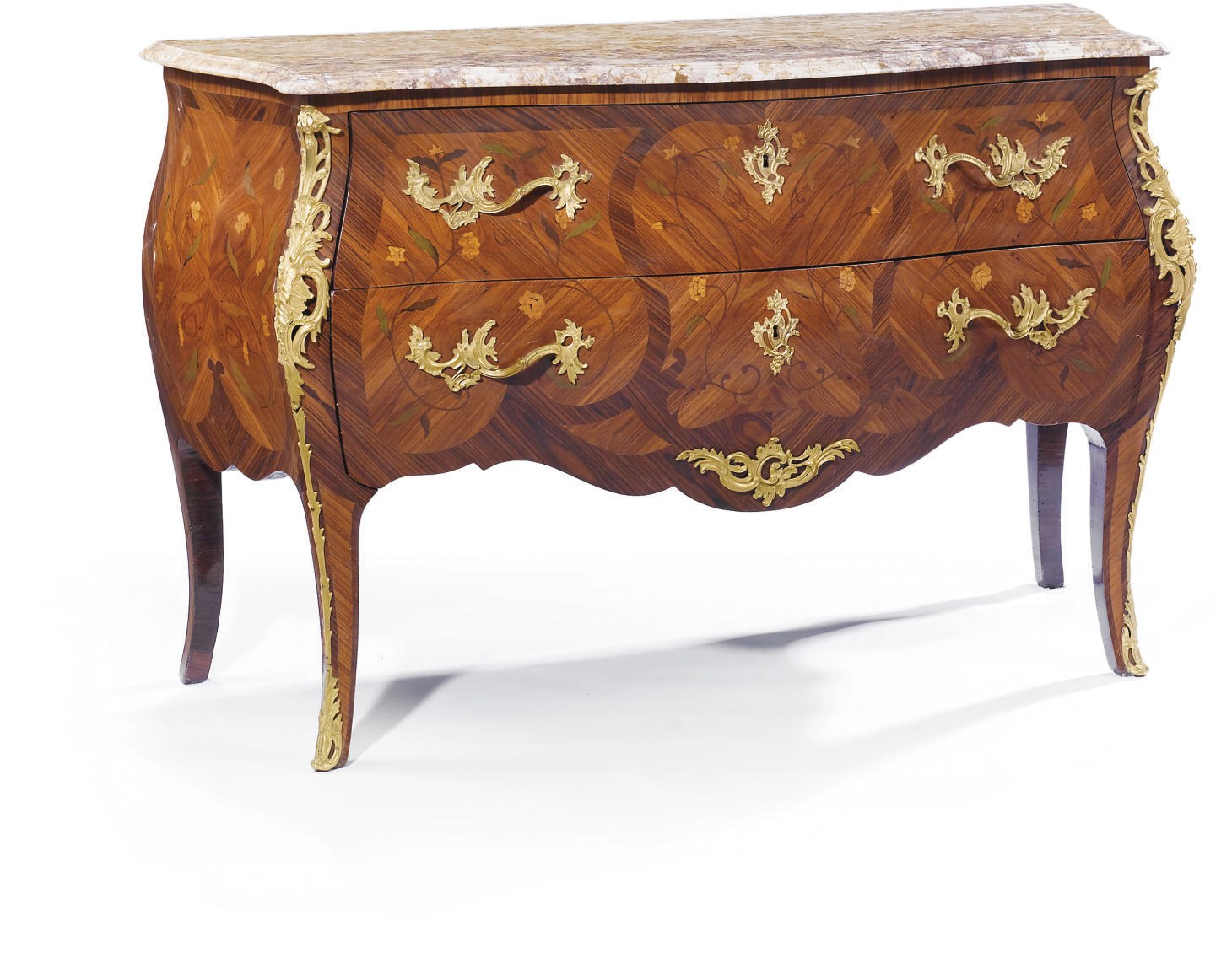 A FRENCH ORMOLU-MOUNTED TULIPWOOD, KINGWOOD AND MARQUETRY BOMBE COMMODE