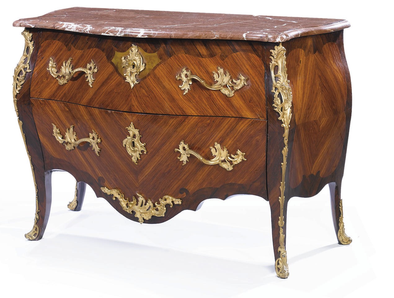 A FRENCH ORMOLU-MOUNTED KINGWOOD AND TULIPWOOD BOMBE COMMODE