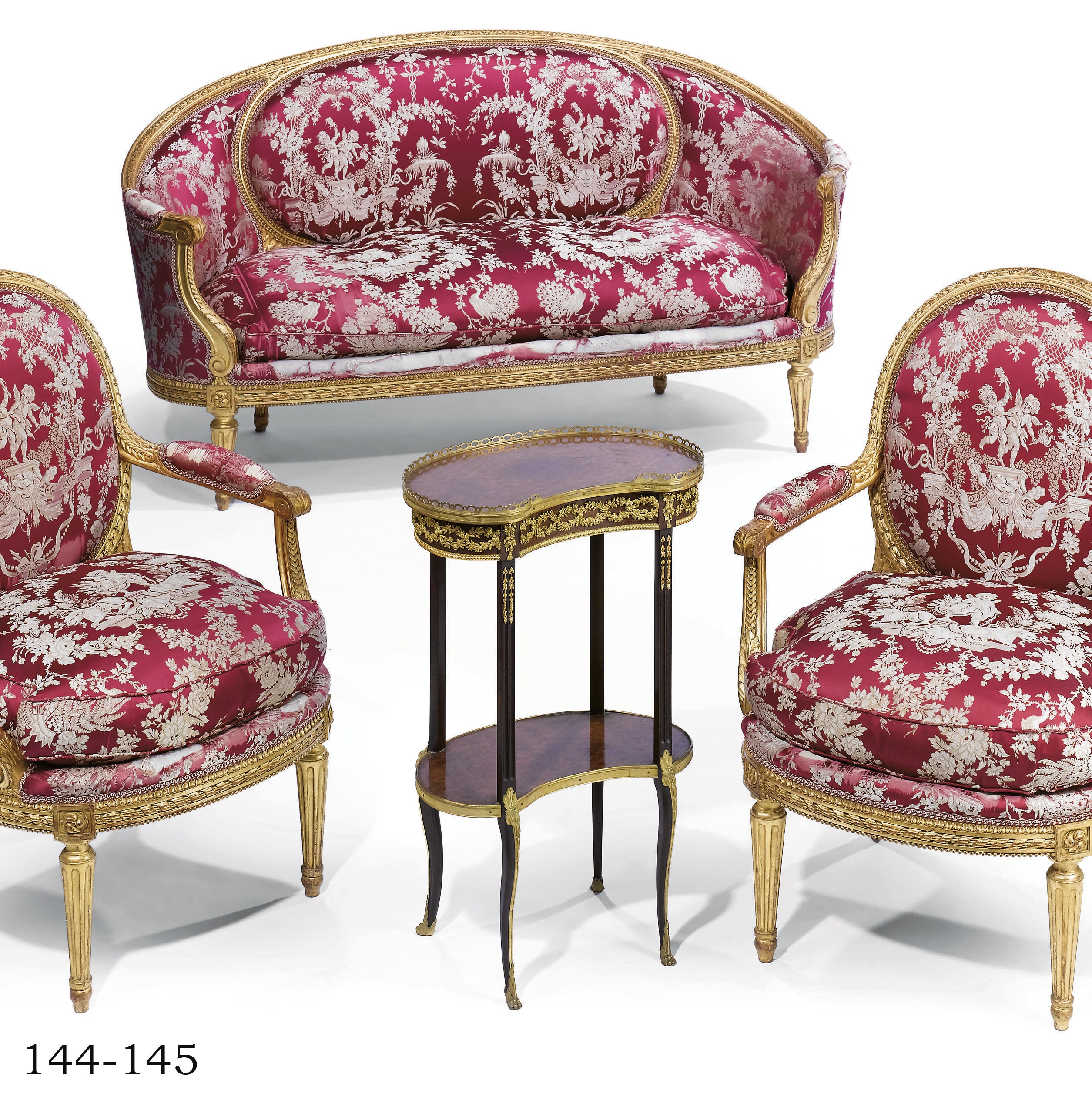 A FRENCH ORMOLU-MOUNTED MAHOGANY AND TULIPWOOD PARQUETRY KIDNEY-SHAPED OCCASIONAL TABLE