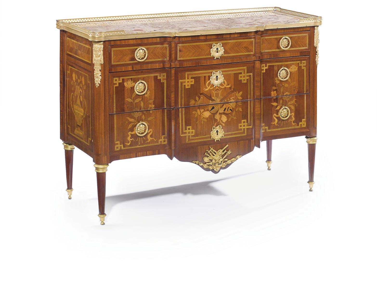 A FRENCH ORMOLU-MOUNTED TULIPWOOD, MAHOGANY AND MARQUETRY COMMODE