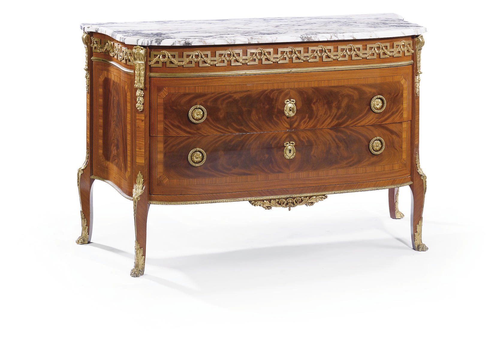 A FRENCH ORMOLU-MOUNTED TULIPWOOD AND MAHOGANY COMMODE
