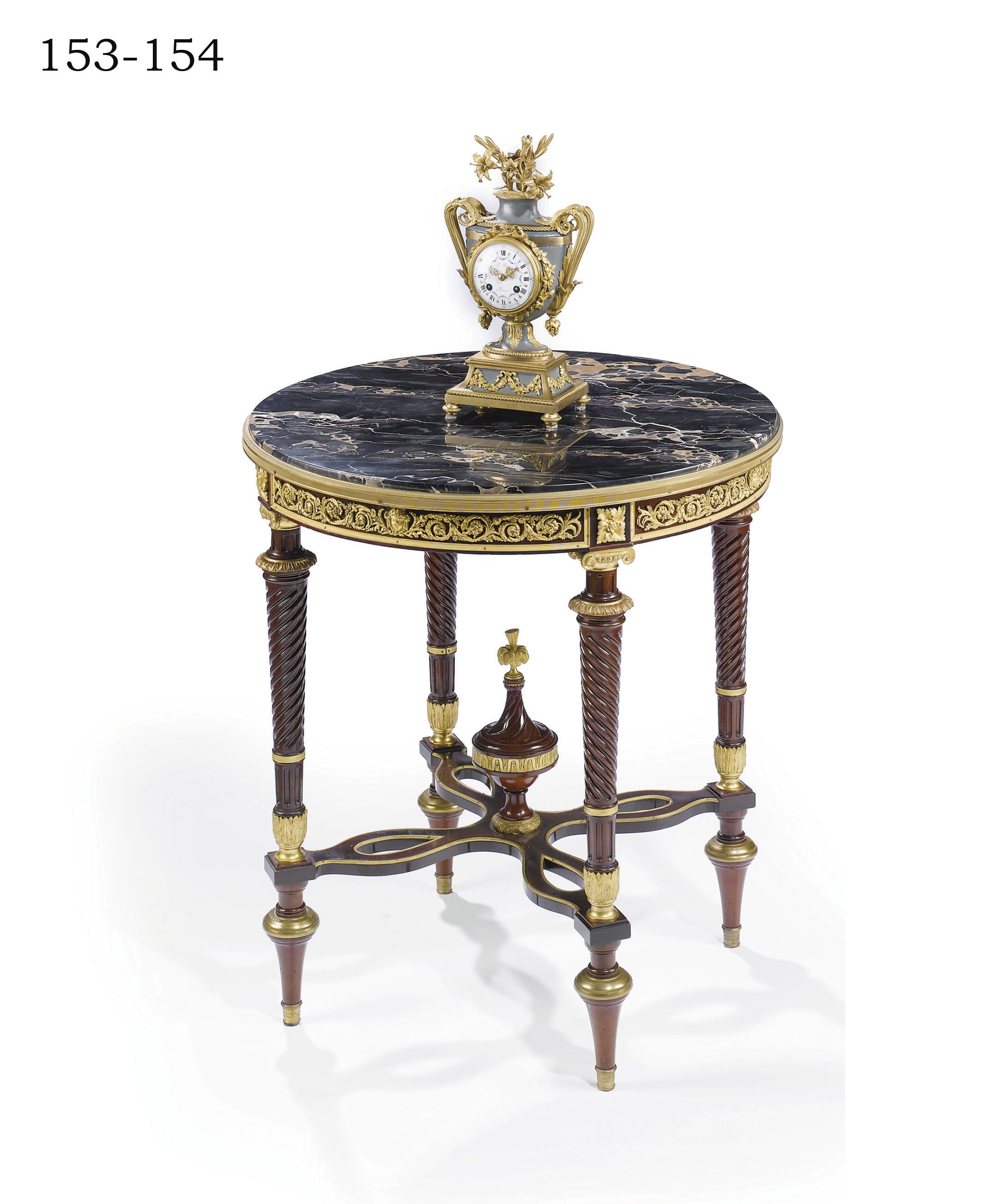 A FRENCH ORMOLU AND GREEN PATINATED MANTEL CLOCK