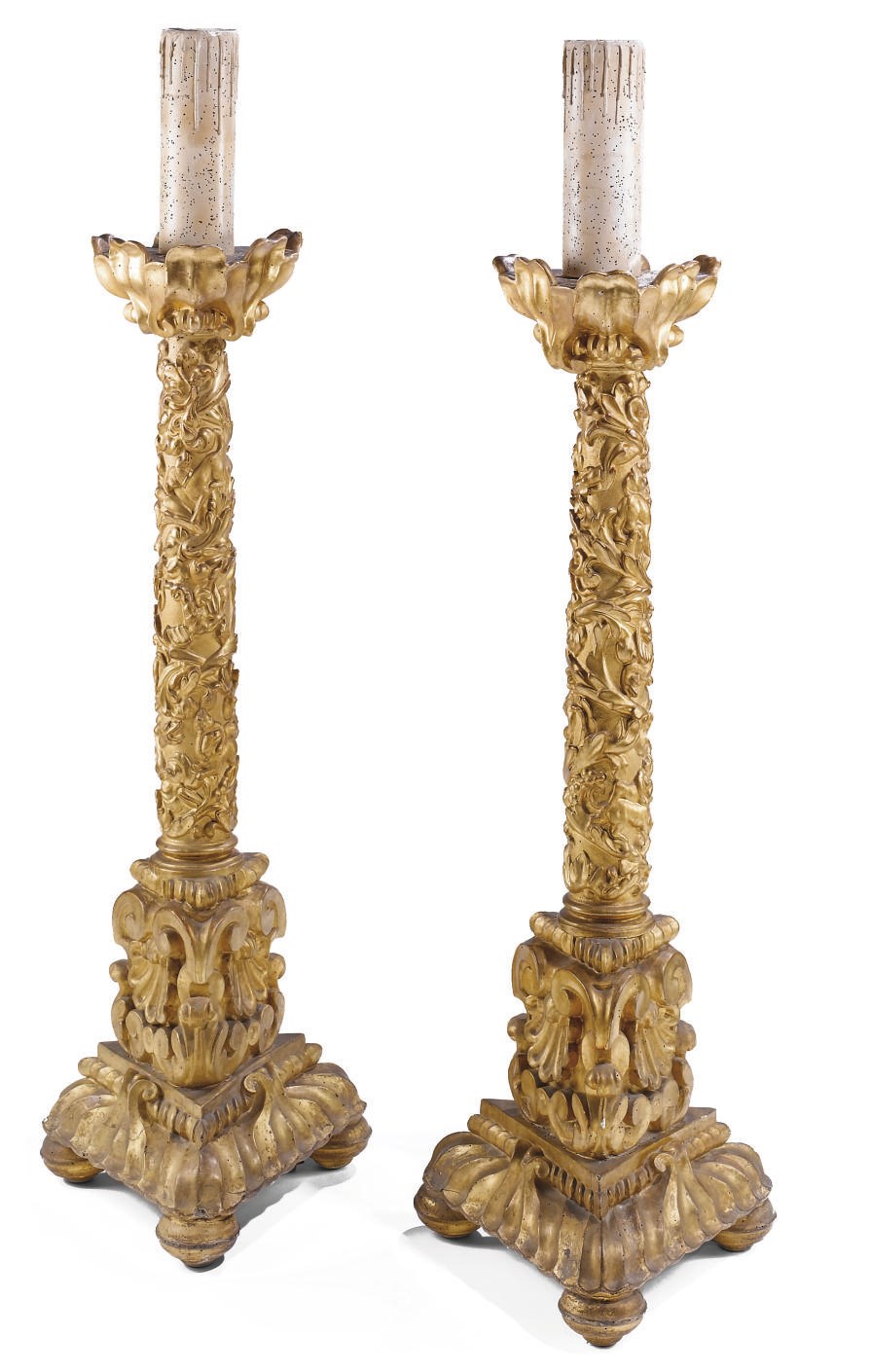 A PAIR OF ITALIAN GILTWOOD TORCHERES, MOUNTED AS LAMPS