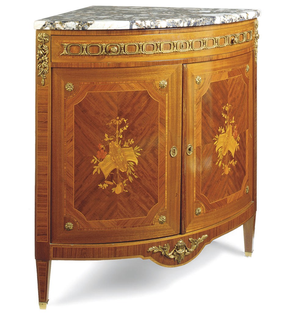 A FRENCH ORMOLU-MOUNTED MAHOGANY, TULIPWOOD AND STAINED FRUITWOOD MARQUETRY ENCOIGNURE