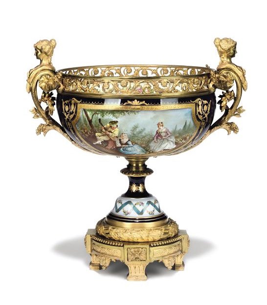 AN ORMOLU-MOUNTED SEVRES STYLE COBALT-BLUE GROUND CENTREPIECE
