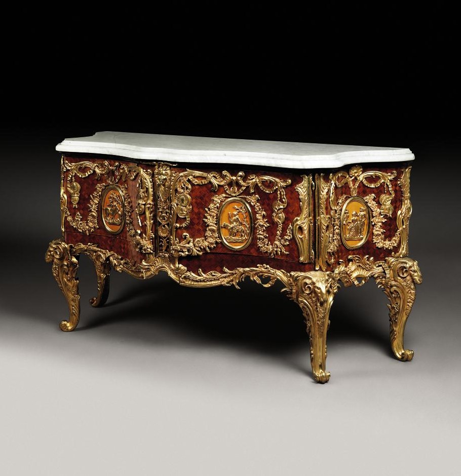 A FRENCH ORMOLU-MOUNTED TULIPWOOD, SYCAMORE AND PARQUETRY COMMODE A VANTAUX