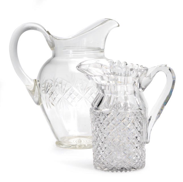 AN ANGLO-IRISH CUT GLASS PITCHER AND A LARGE PITCHER,