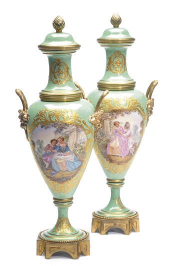 A PAIR OF SEVRES-STYLE GILT-METAL MOUNTED VASES AND COVERS,