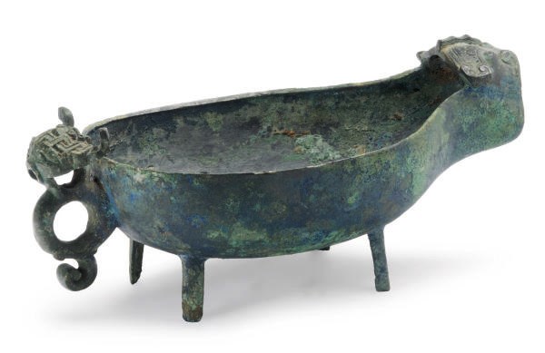 A CHINESE ARCHAIC BRONZE RITUAL POURING VESSEL, YI,