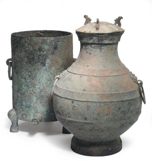 A CHINESE ARCHAIC BRONZE STORAGE VESSEL AND COVER, HU, AND CYLINDRICAL TRIPOD VESSEL,