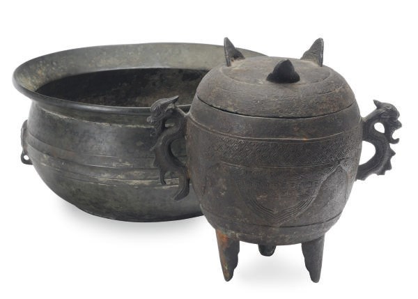 A CHINESE CAST-IRON TRIPOD VESSEL AND COVER,