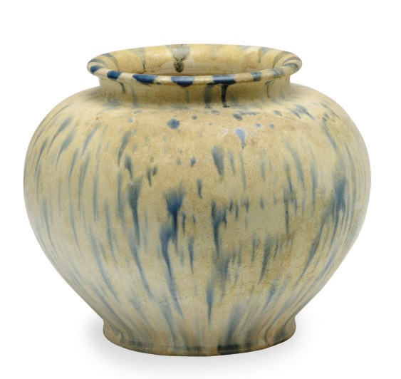 A CHINESE BLUE-SPLASHED CREAM-GLAZED POTTERY OVOID JAR,