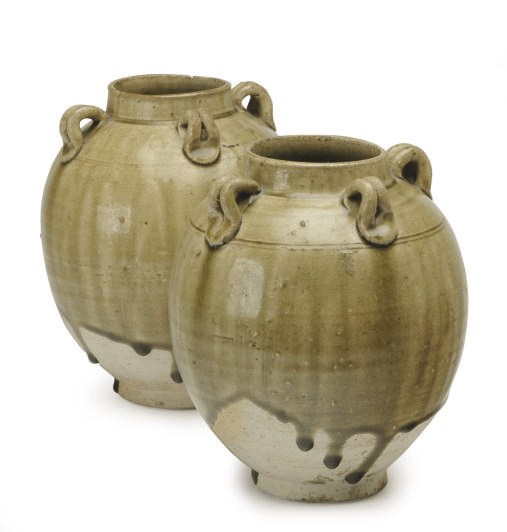 A PAIR OF CHINESE CELADON- GLAZED POTTERY OVOID JARS WITH LUG HANDLES,