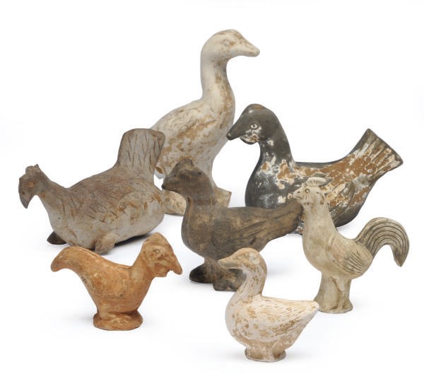 A GROUP OF SEVEN CHINESE PAINTED POTTERY FIGURES OF ROOSTERS AND DUCKS,