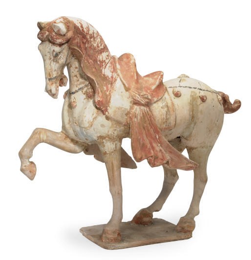 A CHINESE PAINTED POTTERY MODEL OF A PRANCING HORSE,